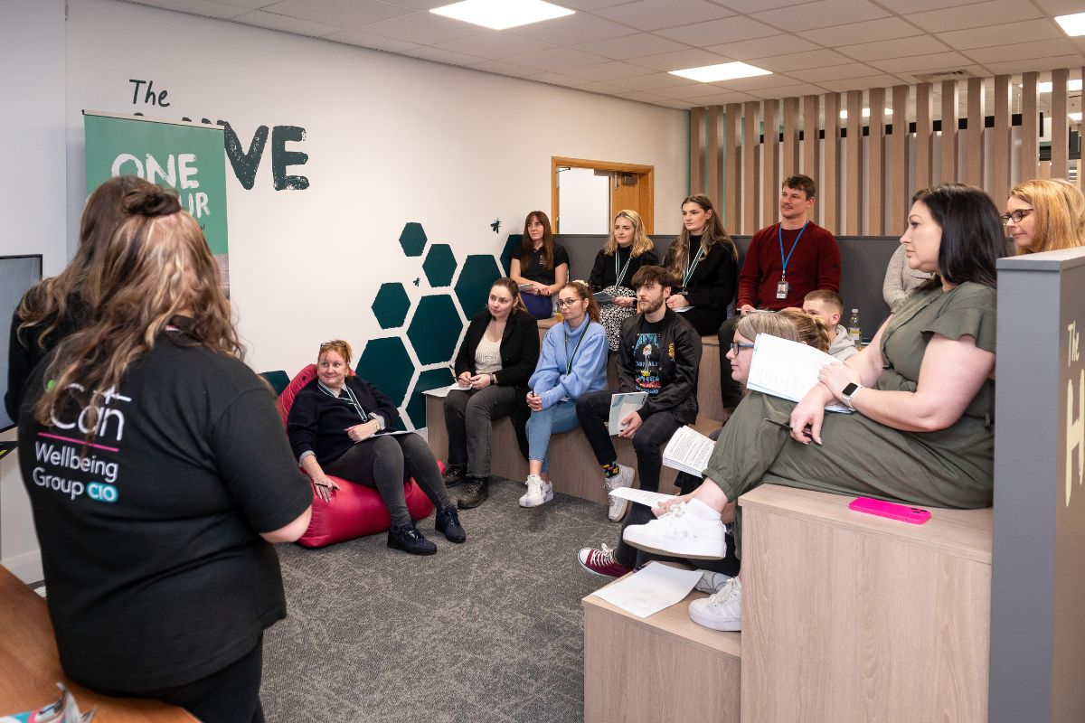 Staff attending a talk during a Wellbeing Day at The Cumberland.